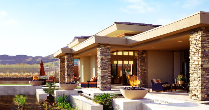 Outside view of a Modern house with a fire pits and a view of mountains